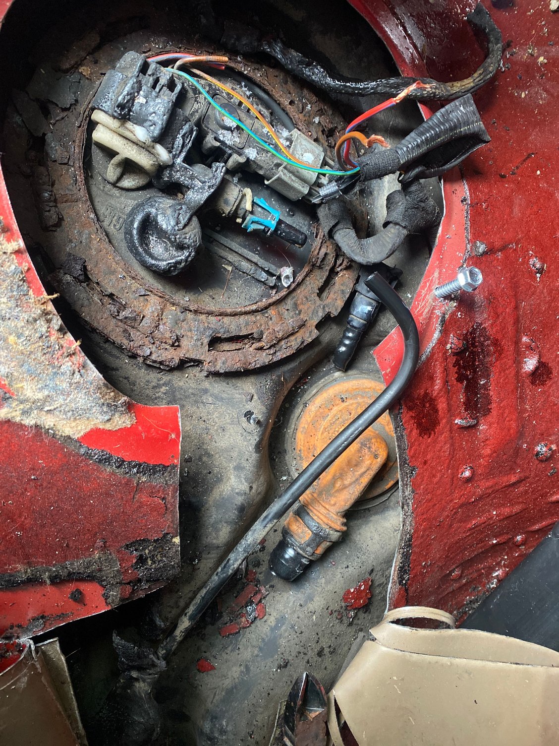 I was thinking the big line from the orange connector but it looks really big to be the return line to me looks more like a vent