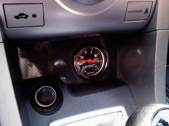 Boost gauge with CF cubby plate.