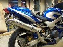 Just swapped the stock mufflers with some high mount Hindle Titanium 16" supersport mufflers. Sounds awesome!