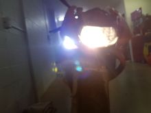 Forward facing spotlight indicator in the fairing vent during rebuild/paint. Since holesawed a stock lens and stuck it over the spot to orangeise it