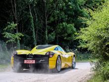 Yellow Huayra kicking up dust. By Pure Power Photography