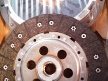 Clutch kit without the flywheel... which is in the first picture.