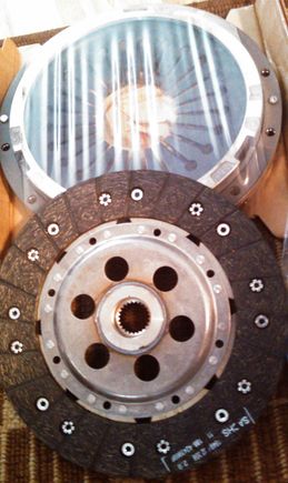 Clutch kit without the flywheel... which is in the first picture.