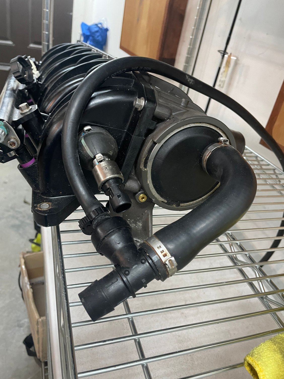 Mercury Verado charge air cooler/Intake manifold with fuel rail