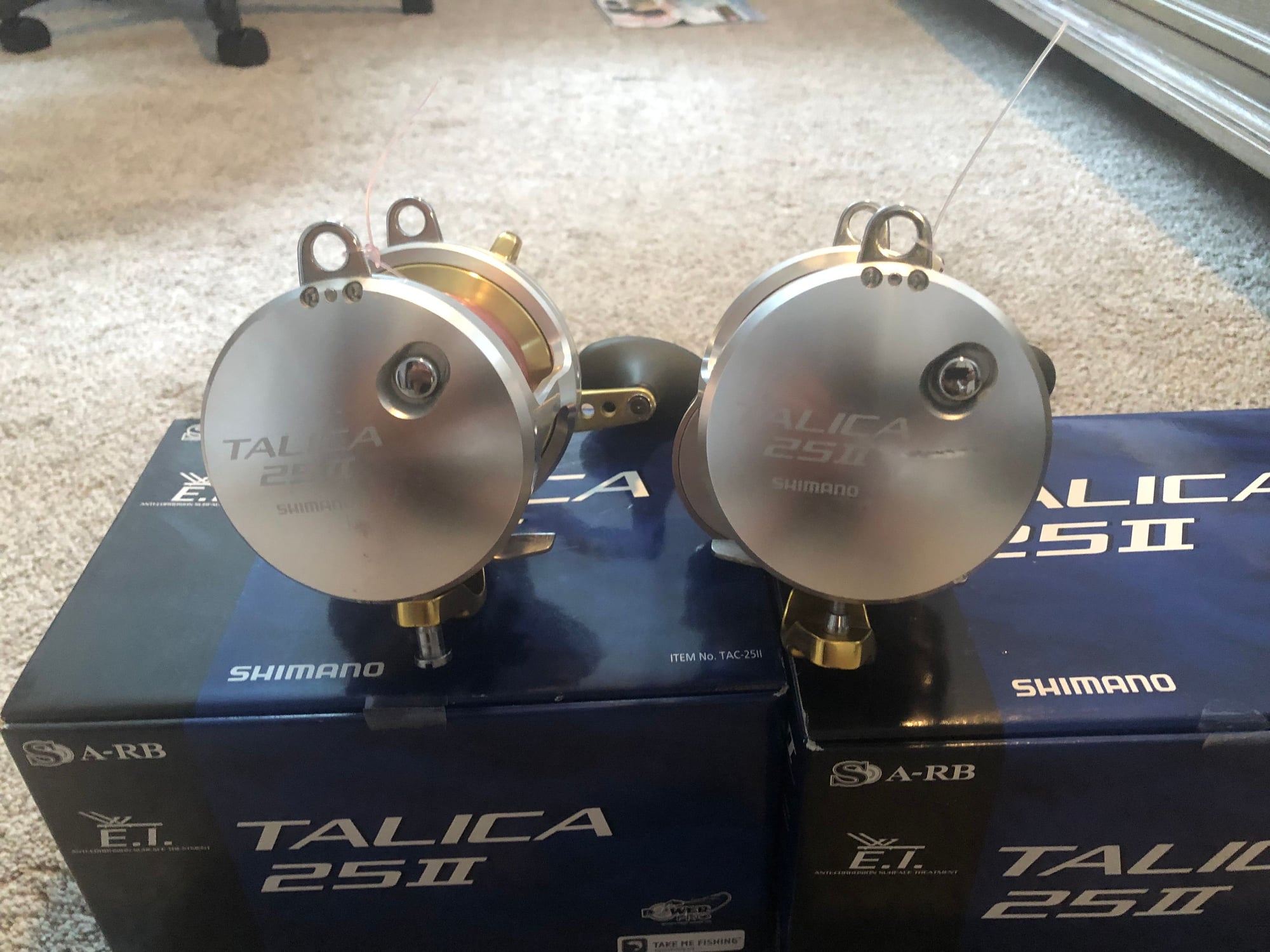 Two Talica 25 two speed reels mint condition - The Hull Truth