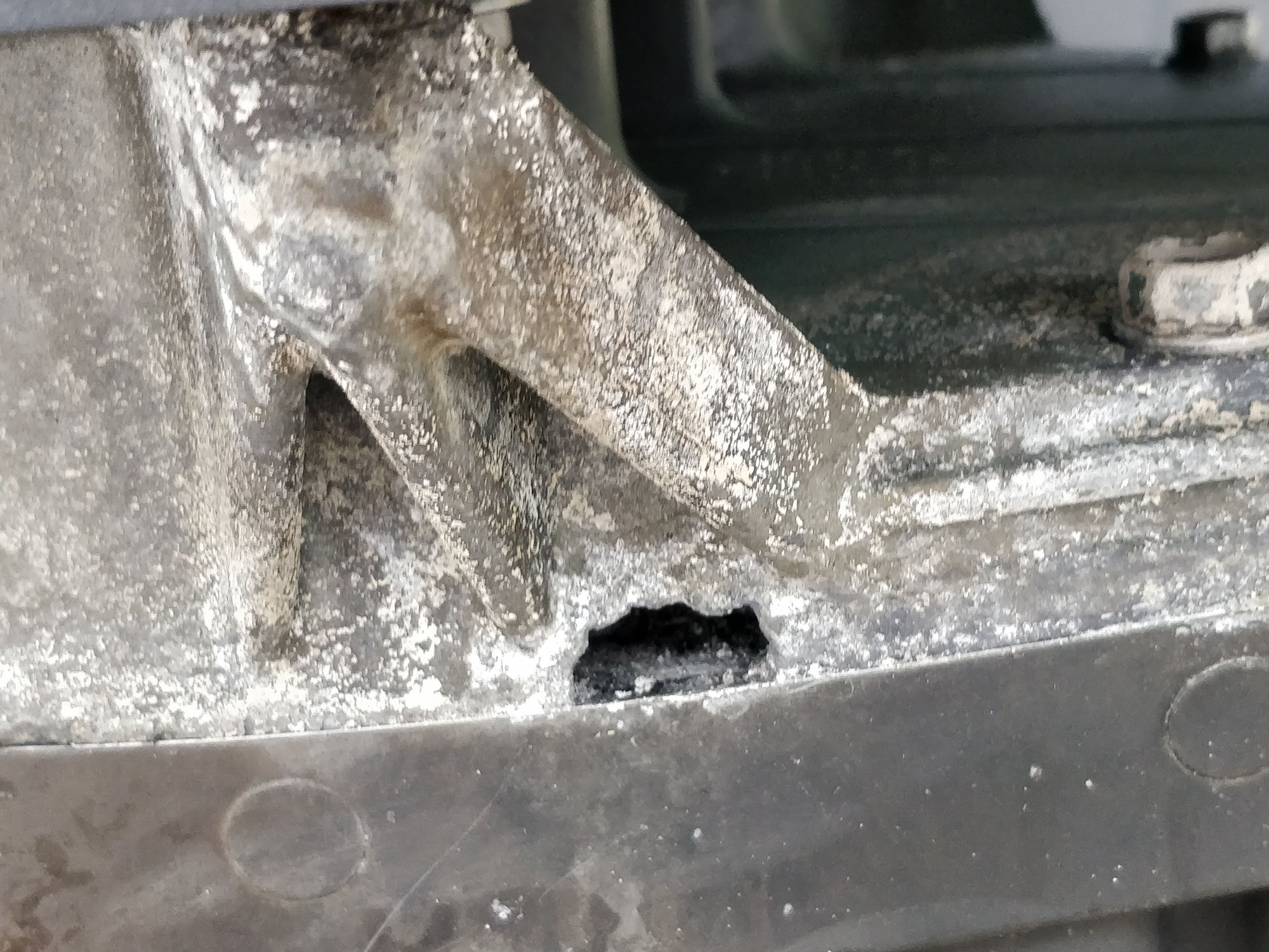 2005 Yamaha F150 hole in upper exhaust burned right through apron on