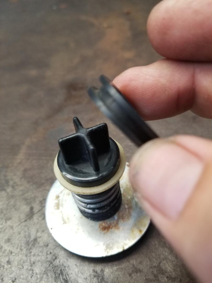 Mercury 135 outboard black max 2 stroke poppet valve question The