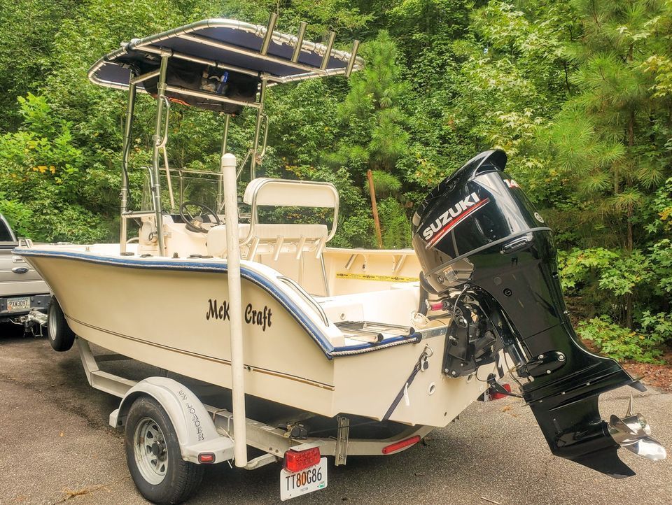 18' Center Console Mckee Craft w/t New 4 Stroke Suziki 140 The Hull
