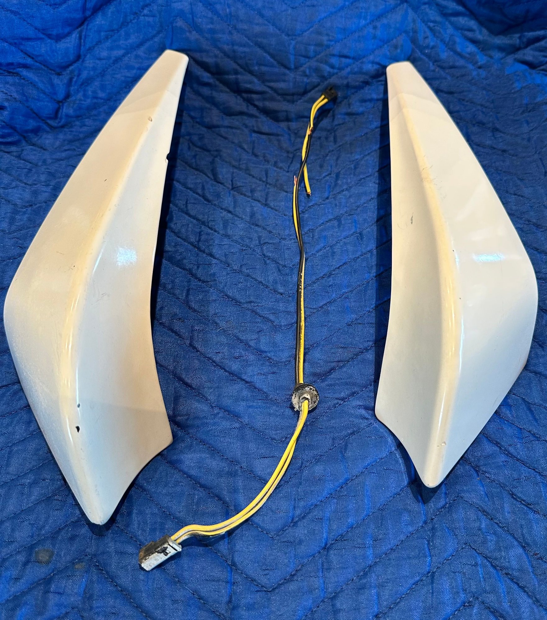 I've got these spoiler pieces from my white '88 basket case Iroc I had about 10 year's ago. Have the wiring harness too (portion from the decklid to the lamp)  but it would have to be repaired.