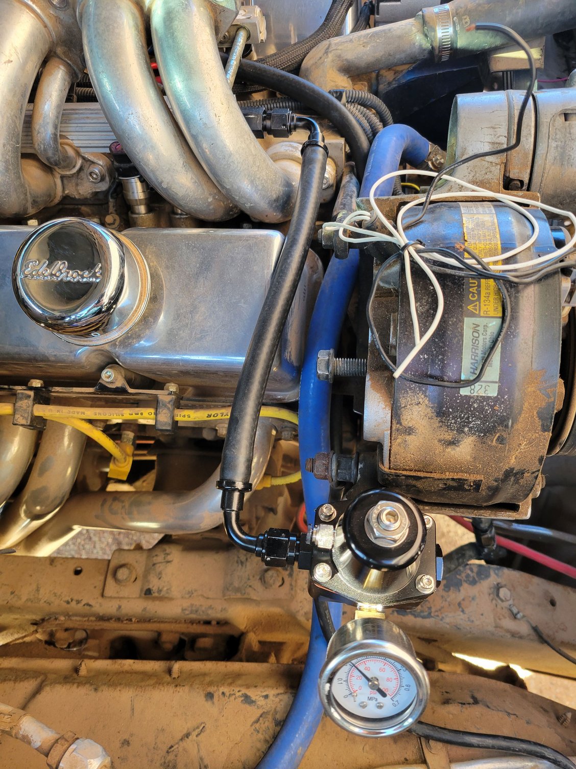 Adjustable regulator temporarily mounted here until I get the AC up and going.