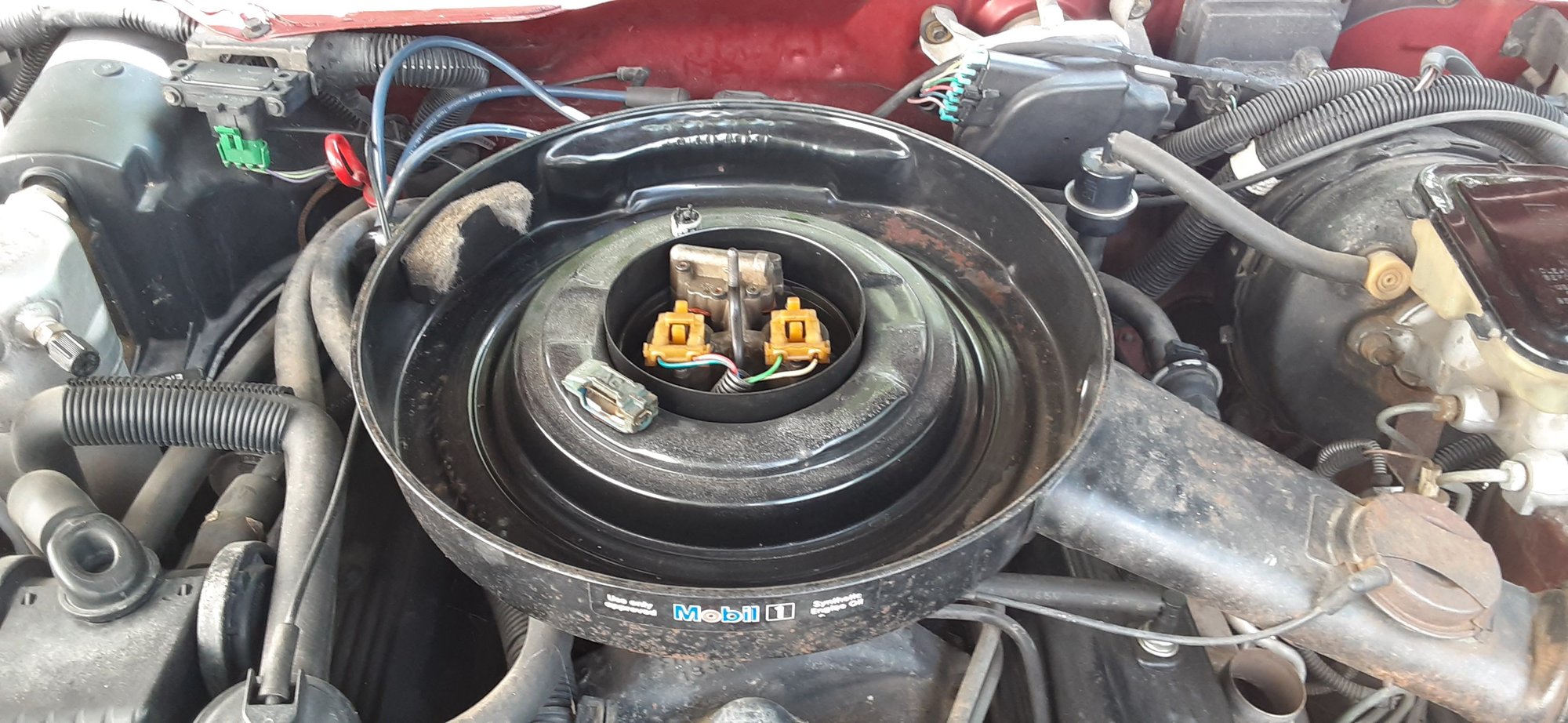 Make sure everything is properly aligned and indexed. Notice notches on TB spacer and the inside of the air cleaner base.