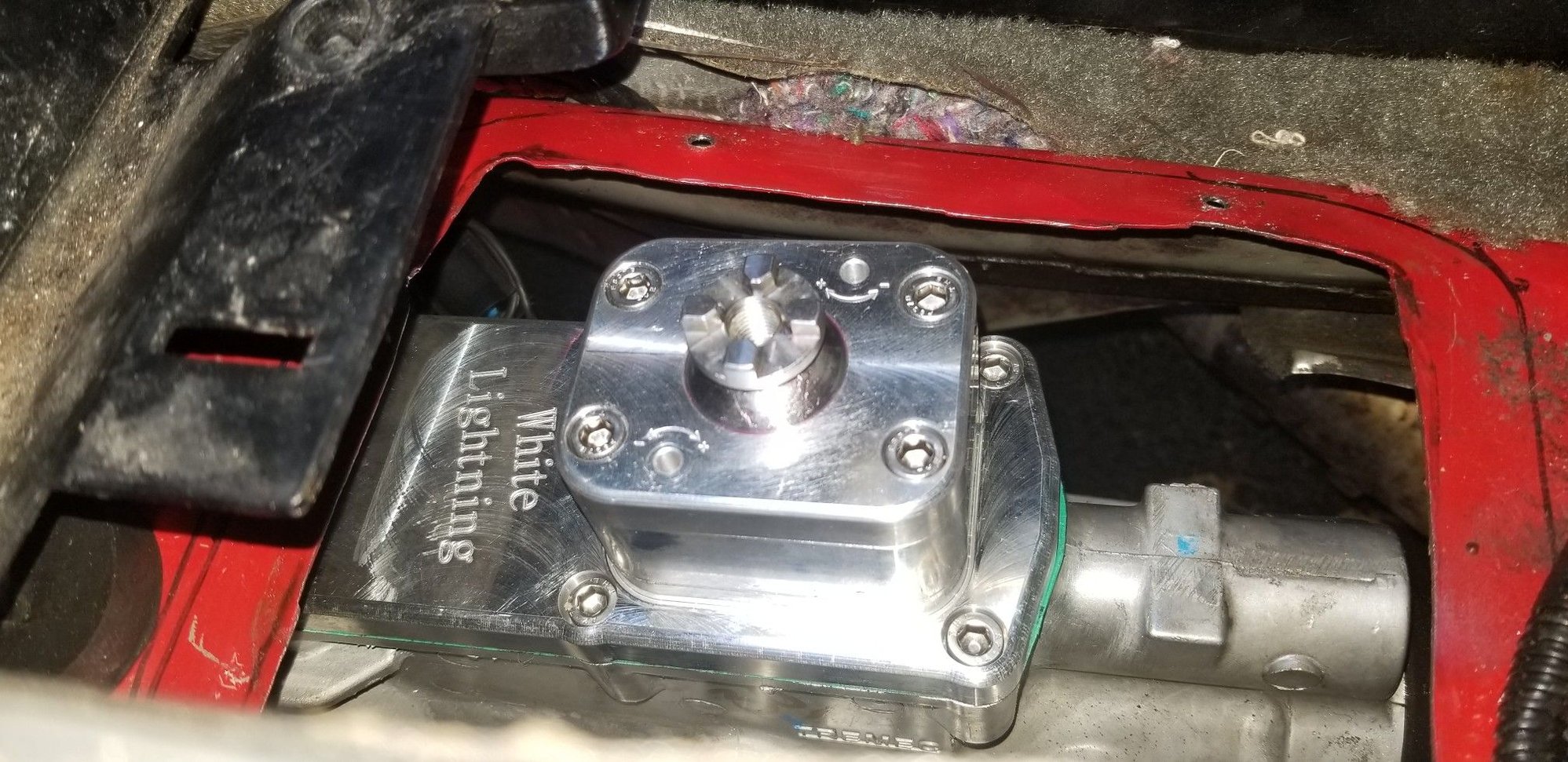 Another view.  You can see the two holes for adjusting the spring bias, though it comes set to 
