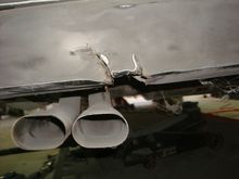 This is the damage on the back. I'm not going to replace the missing chunk but rather fix just the tears.