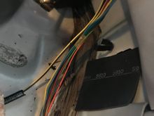 Raise rear carpet to prevent burn through when welding.