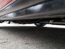 Looking back from the passenger side. 
U can see it doesnt even hang down lower than my sub-frame connectors. 