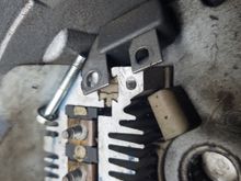 Keep track of the bolts as the one in back is longer than the front one.  These two hold a little doohickey in place. Technical term.