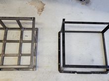 Throw back to the past. On the right is my old fuel cell cage made from angle iron. It worked, but I never liked how flimsy it was, and how the metal frame contacted the aluminum cell. 