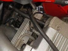 You can see the crowfoot adapter is on the bolt head. should be able to get about a 1/4 turn or so before you have to reposition the crowfoot for another turn.