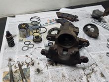 Passenger caliper disassembled.