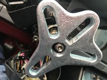 I had to modify the harbor freight steering wheel puller to get it to fit. The slots needed to be elongated with a file to get the bolts to properly seat