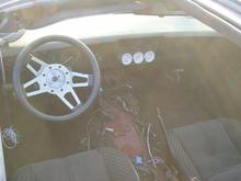 The interior was stripped apart, the wiring was a mess, and everything was filthy.  I ditched the interior since almost none of it was in decent shape, and for a while used a 85-90 Firebird dash and center console.  They were much more comfortable than the heavily plastic Fisher Price "My First Interior" of 3rd gen Camaros.