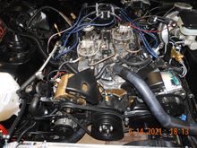 Got the passenger side air system cleaned up and positioned.  Moved forward to maximize distance from headers.  Need to pick up 1.25 inch hose clamps tomorrow.  By the way, loving the 303 aerospace stuff, look at the air valves and hoses, they are old!