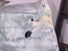 Driver side (where steel bumper bolts on)