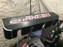 Rubber sealing lip inside coil wire cutouts to keep rubbing and arcing to a minimum. They push down on the coil wires significantly.