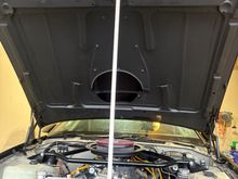 This fibreglass hood is still quite heavy.  Going to trim off the unecessary bits and install some venting which will improve temps under the hood, relieve engine bay pressure and weight.