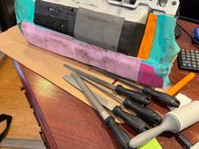 I ported the drivers side using the traditional carbide burrs and sandpaper abrasive rolls.  This method is effective but takes time to master, creates a huge mess, and poses the risk of gouging the aluminum from bad technique or a moments loss of concentration.

That’s when I came across an elegant solution considering the straight tunnel ram style. Use ordinary metal files! They are very precise, carry a low risk of damage, and so clean you can work on the intake on your desk at work!


