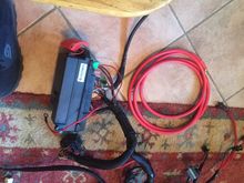 fuse box and battery wire, notice the c100 is lacking the light harness half. If you send me the whole thing I will rebuild it too. As I utlized my ligh harness for my car, you will get just the engine/windshield wiper section of the harness