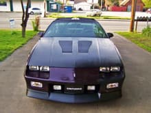 Here's a good picture that shows the added IROC-Z hood, grille insert and foglights. .