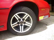 Up close pic of front wheel, McGard black chrome lugs are the best that I ever used...Got a great price at Amazon.com