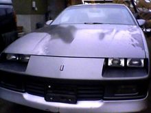 front the more darkish parts on the hood is where paint was peeling the people who i bought the car left some duplicolor spray in the trunk decided to spray it so this was a before pic i guess