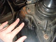 Some rust under the hood.  Will need to patch the wheel well, won't be an issue when I get my welder!  :)