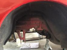 Passenger side rear wheel well