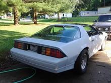 Primed, new front/rear bumper, intake, thermostat, radiator, tires and rims  (I'm restoring the original rims).  Not bad for not started for 12 years.