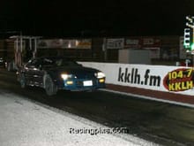 Racing the RS at Ozark International Raceway in 2004.  Friend's Turbo Supra in the opposite lane.  This car had straight pipes, an open element air cleaner, and a PROM from Brian Harris at tbichips.com.  Best pass I ever managed was a 15.7.
