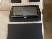 Bought some textured, 1/8" thick ABS plastic from Amazon.  Inexpensive, looks good, and easy to work with.  You can see that one of the pieces is already cut out to the proper shape and is under the ProDash.  This piece of ABS mounts the ProDash to the dashboard.  I call it the inner piece.