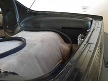 Refitting of the rear panels after painting and new carpet fitments.