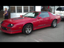 1987 iroc z t.p.i t.top 5 speed car r.p.o cide 81 bright red r.p.o code 19 c i think custom black interior the interior I'd say is a 8.5 out of 10 solid car also hard to find r.p.o code uu8 bose system power windows locks hatch a.c heat will need paint due to poor factory clear coat. 7 miles over 60 k all original but exhaust and k.n filters. Needs very minor things also a true 90 iroc z lb9 solid Texas parts car with it always good to have extra parts good lb9 auto in parts car no title 