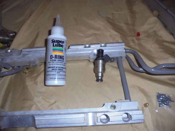 Installing the Accel 24lb injectors.