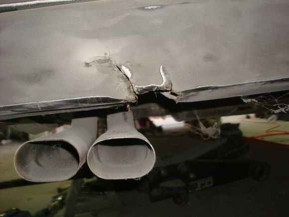 This is the damage on the back. I'm not going to replace the missing chunk but rather fix just the tears.