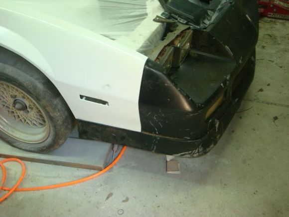 Just checking the nose to fender fit before starting bondo work. It is not bolted on but rather just setting on the studs. Looks to fit pretty good already.