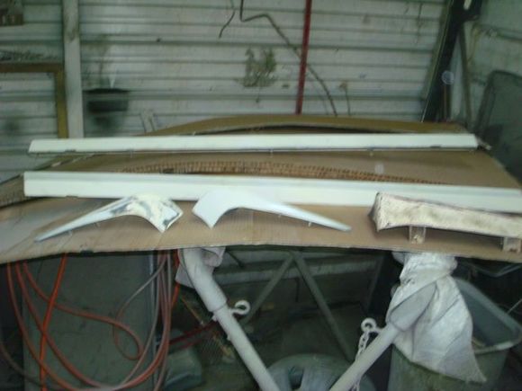 Spoiler corners and door ground effects.