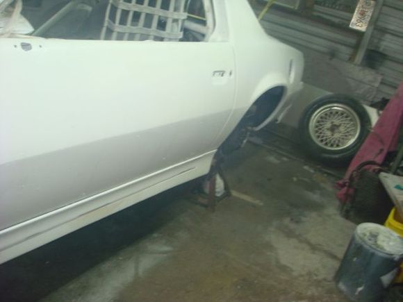 Washing out the bottom side of the car. The body work is mostly roughed in until I go to high build but just trying to get months of sanding dust out from under it.