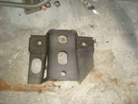 Steering column bracket after soaking in the derusting mix.