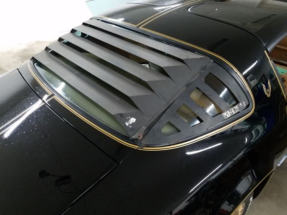 Opposite side.  Again, just resting on the car.