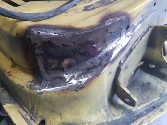 Patch welded in place.  Took a friend of a friend kind of deal, but it turned out great!