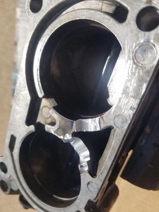 My modified 88 TB with opened up idle air passages.  Used a cutoff wheel for vertical guide cuts and a die grinder with carbide bit to remove the material.  Really glad this work can't be seen once installed!